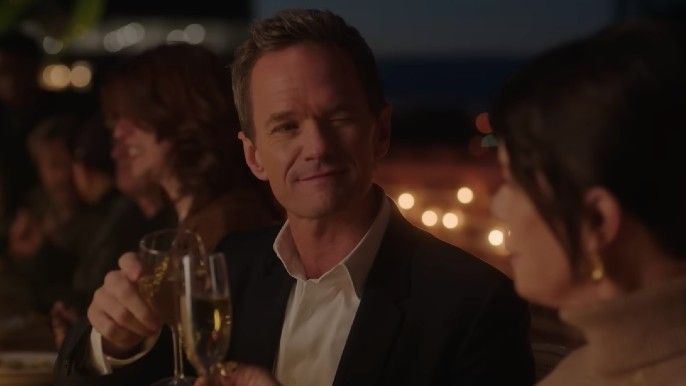 Uncoupled neil patrick harris as michael Marcia Gay Harden as Claire Lewis toasting wine at a dinner party