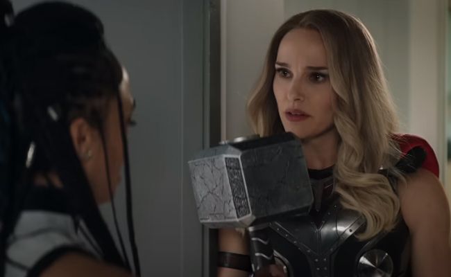 thor love and thunder natalie portman as jane foster holding mighty thor
