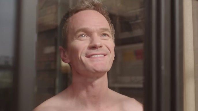 Uncoupled neil patrick harris as michael shirtless looking outside window and smiling