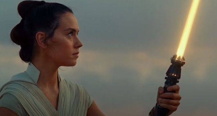 Rey Skywalker wielding her new lightsaber.