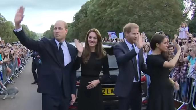 prince-harry-held-meghan-markles-back-to-prevent-her-from-upstaging-prince-william-kate-middleton-sussexes-reportedly-seemed-uncomfortable-during-their-walkabout-with-waless