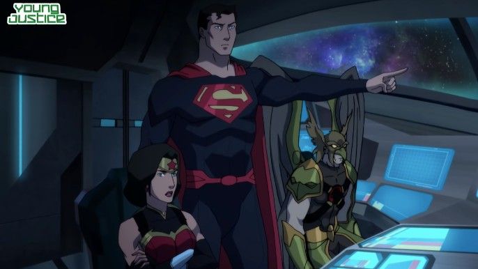 Young Justice Season 3 The League riding vehicle Superman pointing