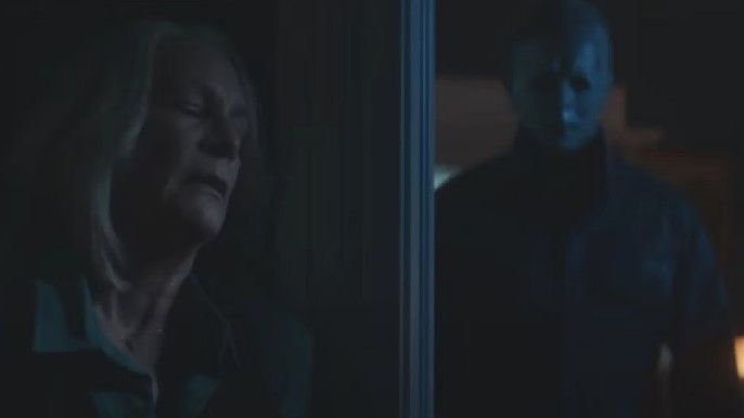 jamie lee curtis as laurie strode hiding from michael myers in halloween ends