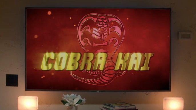 Cobra Kai Season 5 Cobra Kai logo advertisement on TV