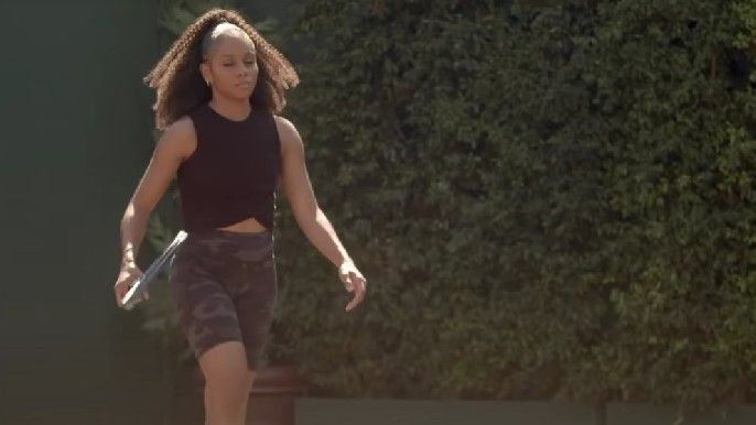 All American: Homecoming Season 1 Geffri Maya as Simone walking to play tennis