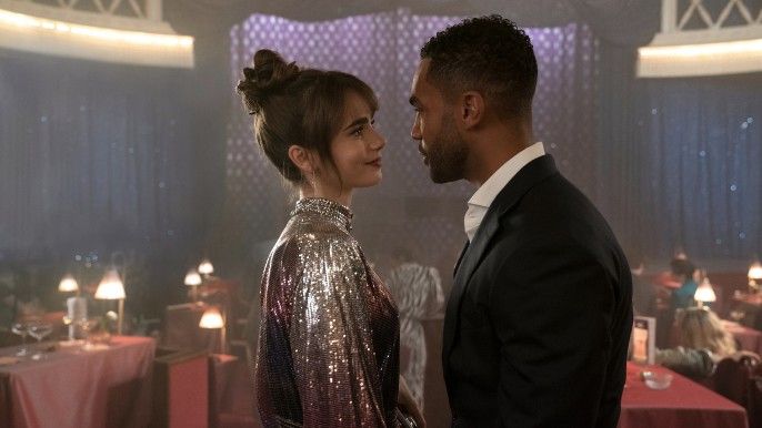 Lily Collins as Emily and Lucien Laviscount as Alfie in Emily in Paris Season 3