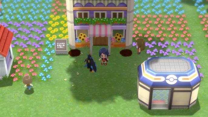 A Pokémon Trainer and their Empoleon standing outside the Pick a Peck of Colors Flower Shop of Floarama Town in Pokémon Brilliant Diamond and Shining Pearl.