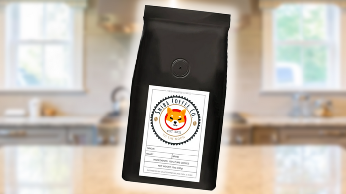 Image of a black Shiba Coffee Company bag, against a background of a white, blurred kitchen counter.
