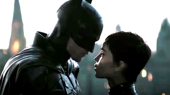 Batman and Catwoman are close to kissing.