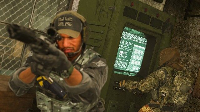 Modern Warfare 2 Gaz Operator guarding Farah using computer