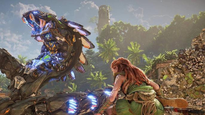 Horizon Forbidden West Aloy vs a Slitherfang. Aloy is crouching in the foreground of the image as the large snake-like machine has reared up and is hissing in the background. 