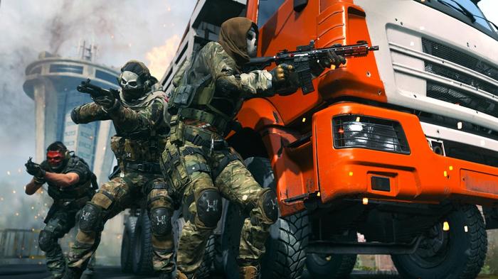Image showing Modern Warfare 2 players taking cover behind truck