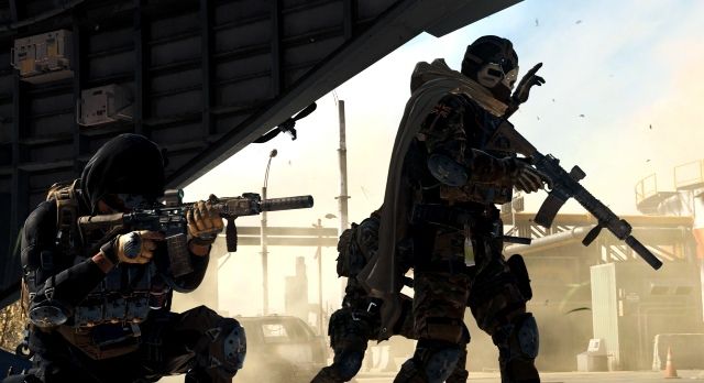 Image showing Warzone 2 players standing near aeroplane