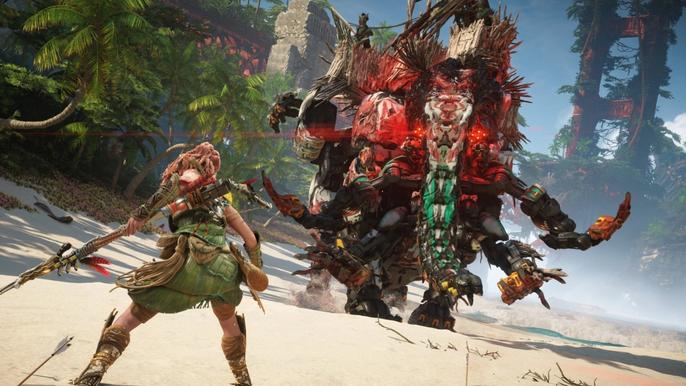 Horizon Forbidden West. Aloy is facing a large and angry Tremortusk machine on a beach.