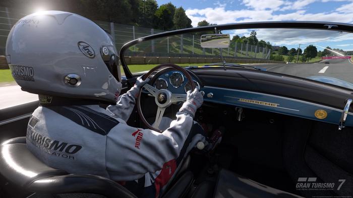 Dashboard shot of a driver racing in Gran Turismo 7.