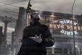Niko Bellic stood in front of Liberty City in GTA 4.