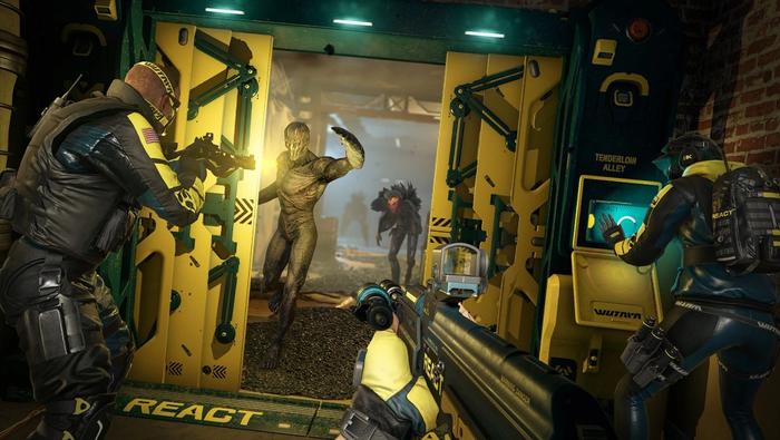 Rainbow Six Extraction screenshot - three soldiers in an airlock. Soldier on left is firing his gun at a nearby Archaen. Soldier on the right is at a computer terminal, trying to close the airlock. Soldier in the middle is aiming at the incoming Archaens.