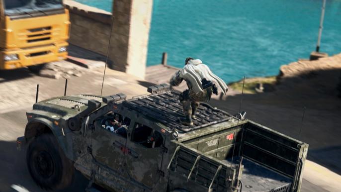 Image showing Warzone 2 player standing on moving SUV