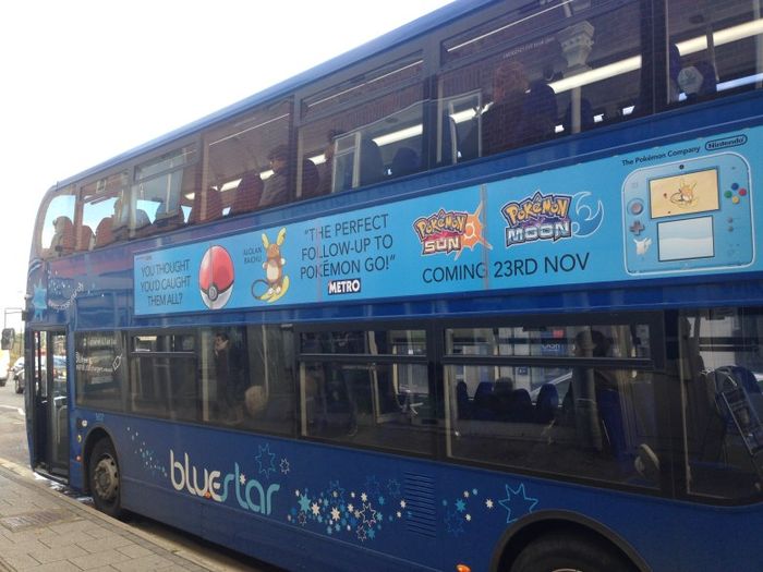 A banner ad on a UK bus enticing Pokemon GO players to pick up Pokemon Sun and Moon.