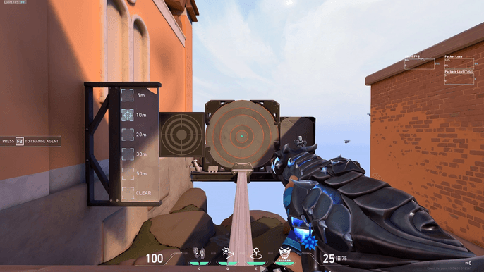 This image shows the Elderflame Vandal with a circular crosshair being used during training in Valorant.