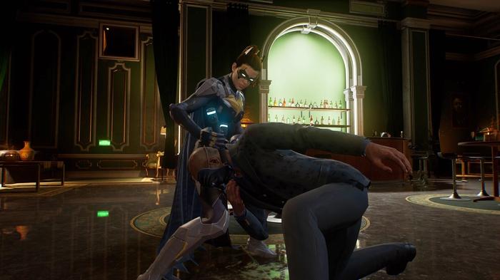 Batgirl performing a silent takedown in Gotham Knights.