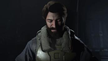The Pilot from Halo Infinite looks forlornly downwards.