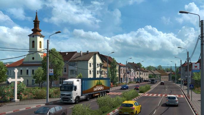 A sunny city with cars in Euro Truck Simulator 2.