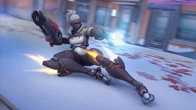 Image of Sojourn sliding while firing a gun in Overwatch.