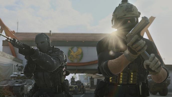 Modern Warfare 2 players loading pistol and holding assault rifle
