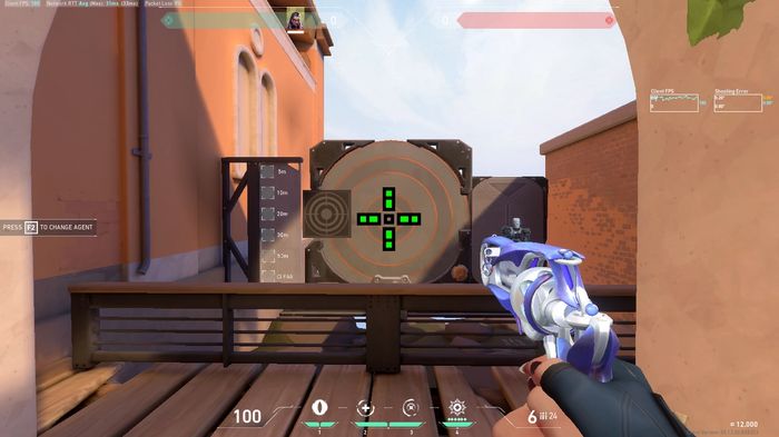 Valorant player aiming at target with huge crosshair