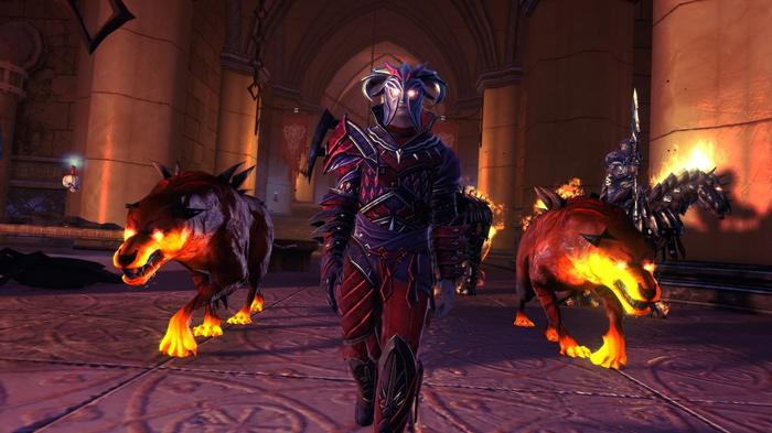 Image of a villainous character and two demon dogs in Neverwinter.