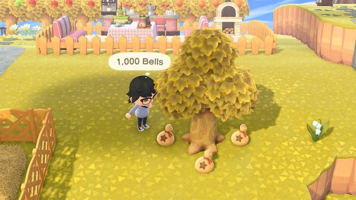 A player looking at bells after having shaken a money tree in Animal Crossing: New Horizons.