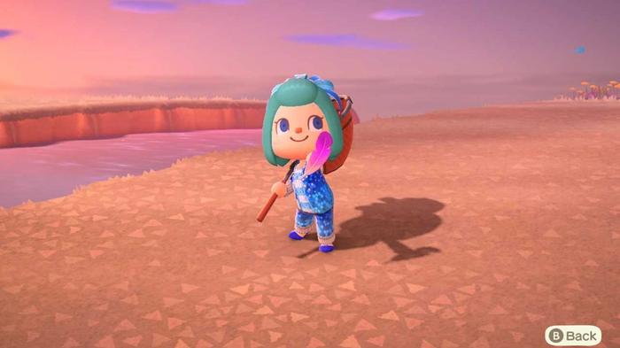 Animal Crossing New Horizons. The player is showing off a purple festivale feather that they have caught.