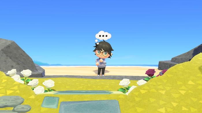 A player using the Thought reaction on a beach in Animal Crossing: New Horizons.