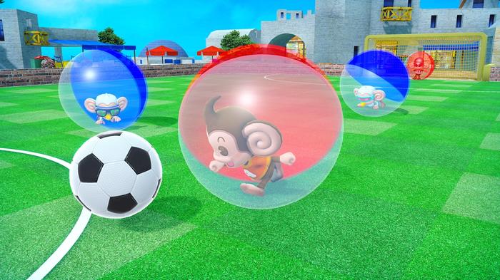 Super Monkey Ball Banana Mania - Monkey Soccer minigame. AiAi in red/clear ball kicking a football across soccer pitch. 