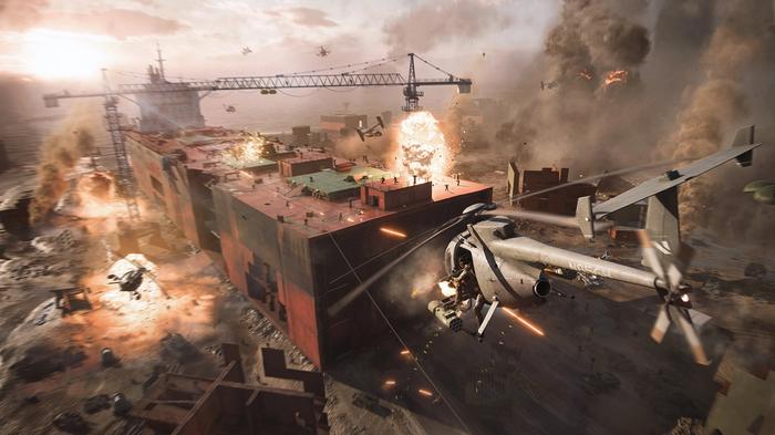 A Battlefield 2042 helicopter shoots at a bunch of soldiers battling on the rooftop.