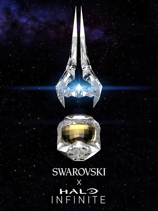 The Halo Infinite x Swarovski collectables, with the energy sword above the Mjolnir helmet.