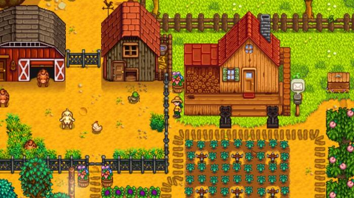 Stardew Valley, the player's farm is next to animal barn with crops in front of it. There are two animals in the fenced-off barn on the left and there are crops ready to harvest in front of the house on the right. 