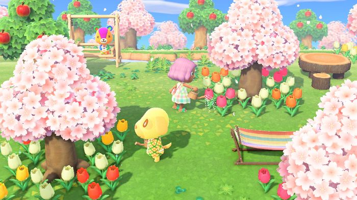 A player and villager watering normal flowers and hybrid flowers in Animal Crossing: New Horizons.