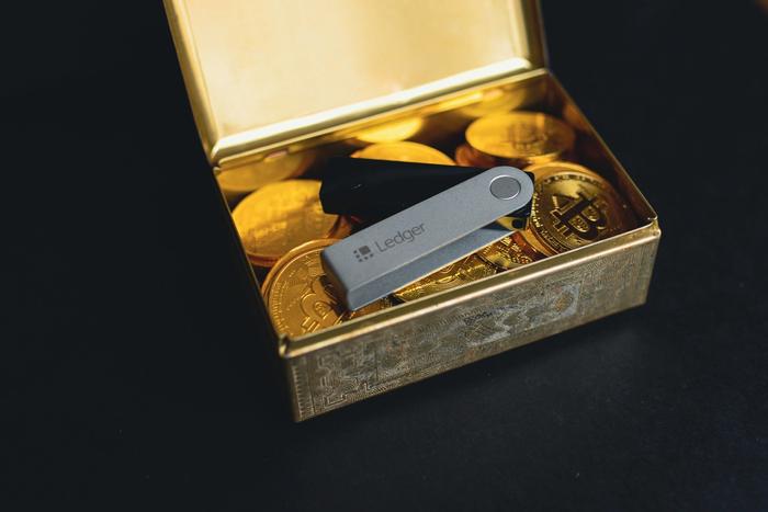 crypto tokens in a small storage box