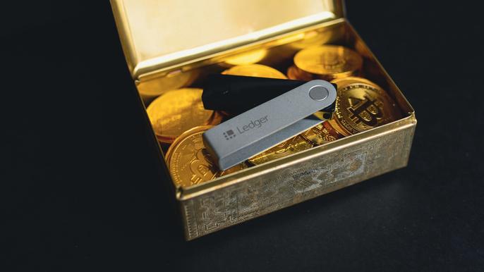 crypto tokens in a small storage box