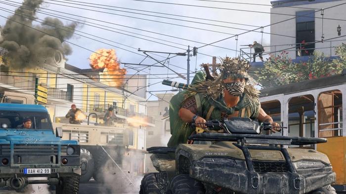 Image showing Warzone players fighting across rooftops and in vehicles