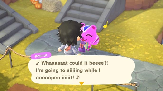 A villager singing after a player gives them a present in Animal Crossing: New Horizons.