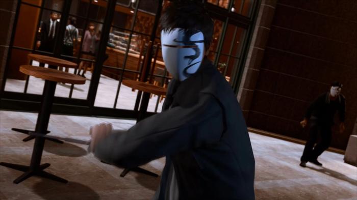 Masked enemy attacking Yagami with weapon