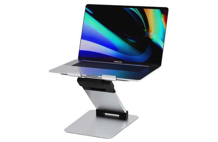 Best laptop stand ObVus Solutions, product image of silver laptop stand with MacBook 