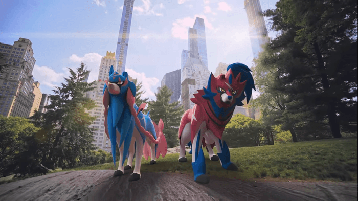 Zacian and Zamazenta appear in a real-world park.