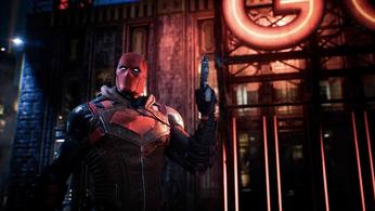Red Hood holding a gun in Gotham Knights