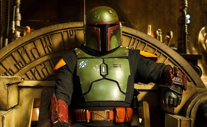 Boba Fett sits on his throne in Jabba's palace.