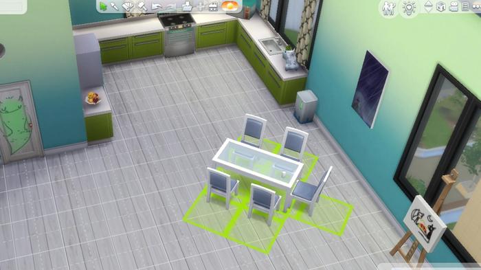 Sims 4. The image shows a dining table that has been rotated clockwise and the grid marks below it are green.