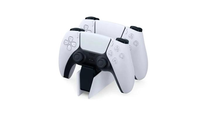 Best gift ideas for gamers - Sony product image of two white controllers on top of a black and white charging dock.